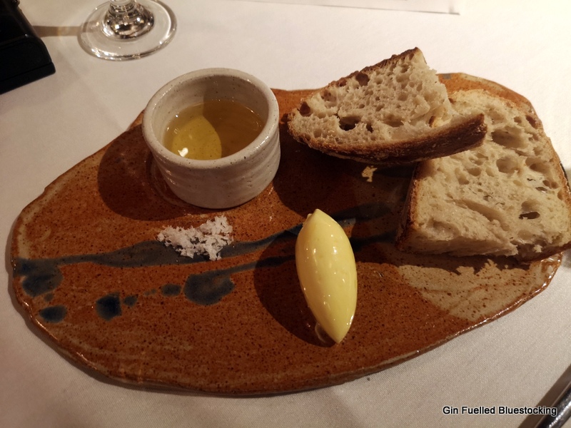 Image: The bread course from James Martin Manchester, on a clay plate.