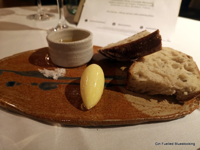Image: The bread course from James Martin Manchester, on a clay plate.