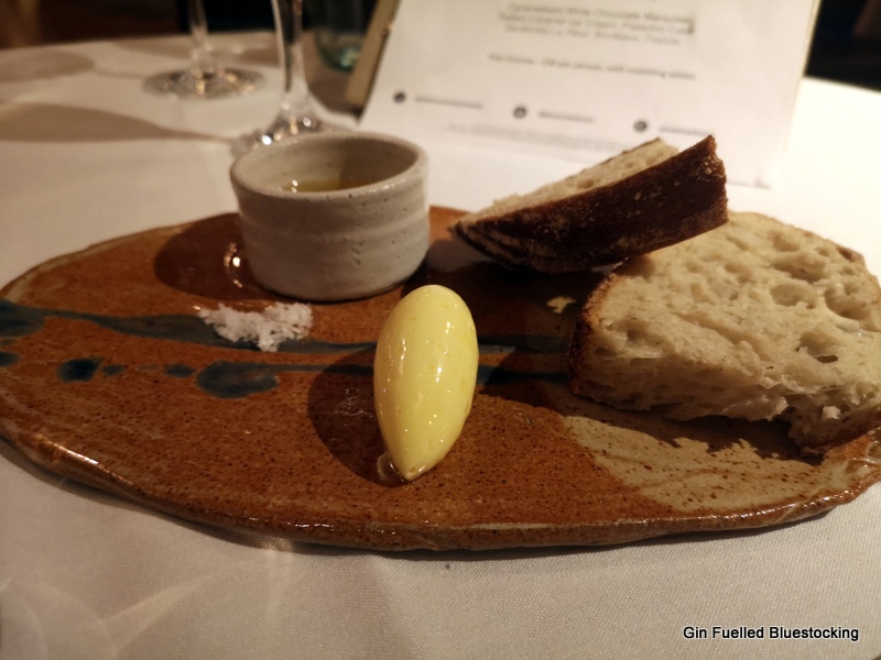 Image: The bread course from James Martin Manchester, on a clay plate.