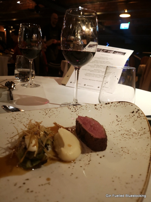 Image: Duck breast main course from James Martin Manchester with the accompanying red wine.